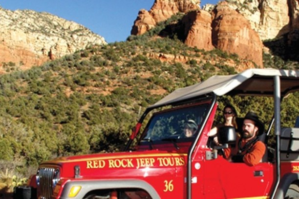 a fire truck parked in front of a mountain